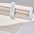 KALIA custom motorized roller shades with remote control and premium linen fabric