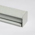 Rolled custom linen roller shade showing beige textured fabric and clean bottom bar detail