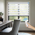 Wireless remote controlled motorized zebra shades in a stylish home study, highlighting precise positioning and quiet operation