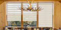 Zebra blinds from KALIA featuring a linen-like texture,