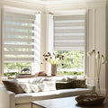 Beige zebra shades on large living room windows, modern style