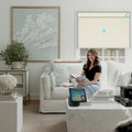 Motorized solar shades providing privacy and light control in a home interior
