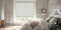 Beige linen roller blinds in bedroom window, light filtering design creates calm ambiance with natural linen texture